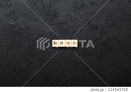 news word written on wood block. news text on table, concept news word written on wood block. news text on table, concept 114343728