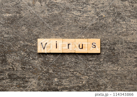 virus word written on wood block. virus text on cement table for your desing, concept virus word written on wood block. virus text on cement table for your desing, concept 114343866