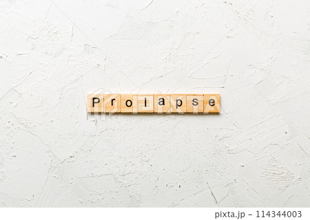 prolapse word written on wood block. prolapse text on table, concept 114344003