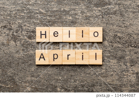 hello april word written on wood block. hello april text on table, concept hello april word written on wood block. hello april text on table, concept 114344087