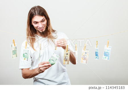 Rich man with laundry of money Rich man with laundry of money 114345183