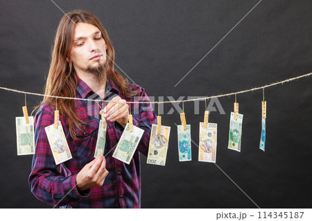 Rich man with laundry of money Rich man with laundry of money 114345187