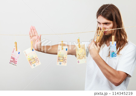 Young man sick of money Young man sick of money 114345219