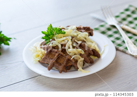 fried liver waffles with onions and herbs fried liver waffles with onions and herbs 114345303
