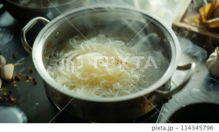 Closeup of a pot with shirataki noodle in the kitchen 114345796