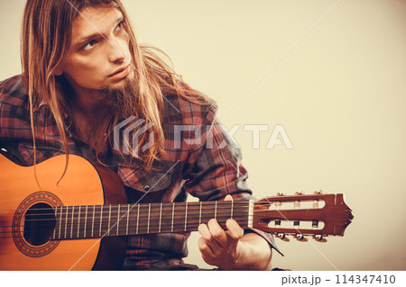 Boy with guitar. 114347410