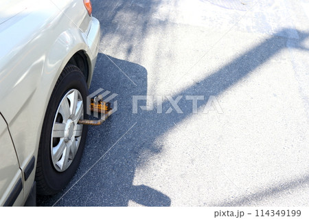 Metal locked car illegal parking in Thailand. 114349199