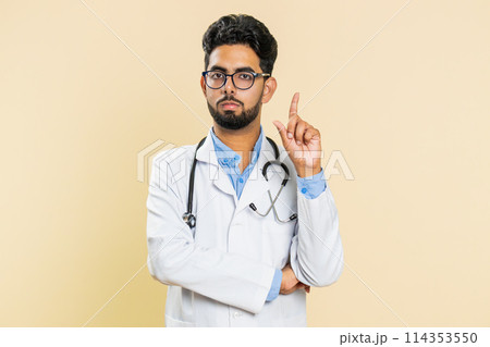 Displeased upset doctor man reacting to unpleasant awful idea, dissatisfied, shake head No, dislike Displeased upset doctor man reacting to unpleasant awful idea, dissatisfied, shake head No, dislike 114353550