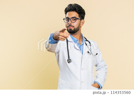 Smiling happy doctor man pointing forward to camera, choosing lucky winner, indicating, promotion 114353560