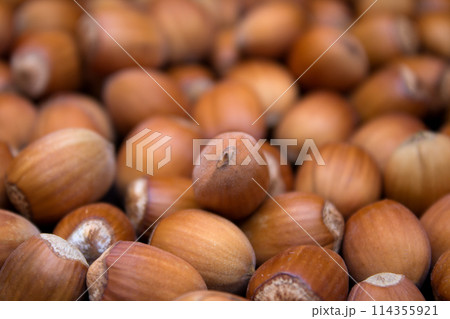 Many peeled hazel nuts - background of nature 114355921