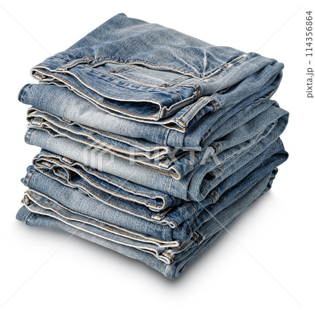 Stack of folded aged blue denim jeans 114356864