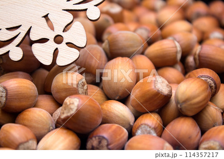 Many peeled hazel nuts - background of nature 114357217