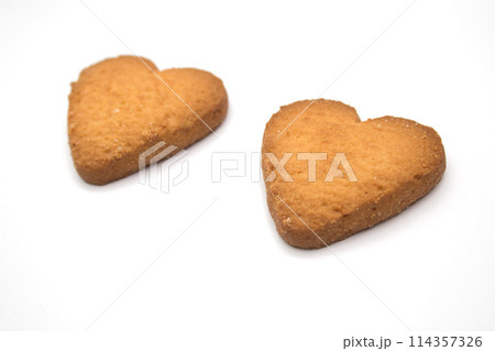Two cookies in the form of hearts - symbol of love 114357326
