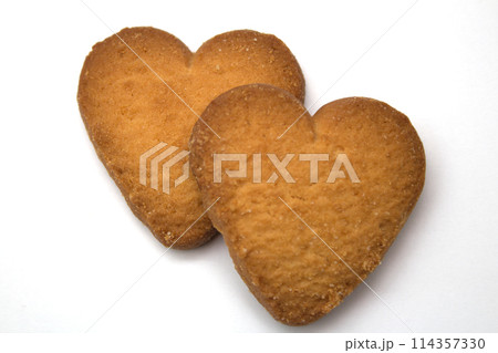 Two cookies in the form of hearts - symbol of love 114357330