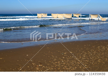 Sandy beach on the shores of the Mediterranean Sea in northern Israel. Sandy beach on the shores of the Mediterranean Sea in northern Israel. 114359430