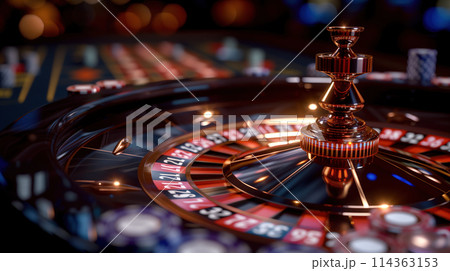 Busy Casino Roulette Table Covered in Chips 114363153
