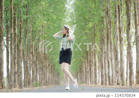 asian woman happy with travel and relax at outdoor on spring season 114370834