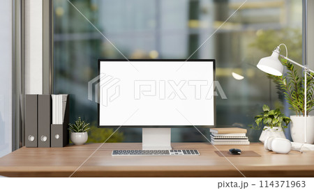 A contemporary luxurious home office or private office room interior features a computer mockup. A contemporary luxurious home office or private office room interior features a computer mockup. 114371963