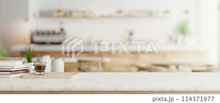 A white marble tabletop in a contemporary minimalist coffee shop cafe. A white marble tabletop in a contemporary minimalist coffee shop cafe. 114371977