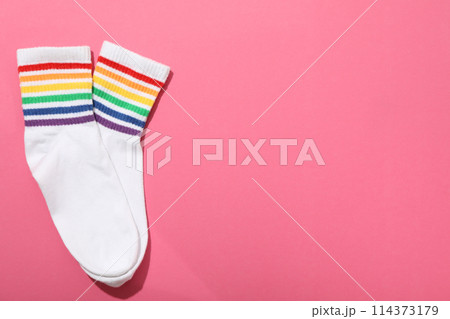 LGBT parade concept, colorful symbols on pink background. 114373179