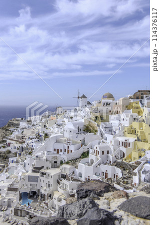 Greece, Santorini, Oia, view of the village with windmills Greece, Santorini, Oia, view of the village with windmills 114376117