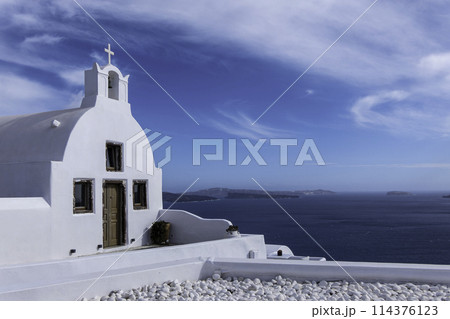 Greece, Santorini, Oia, white church in front of the sea 114376123