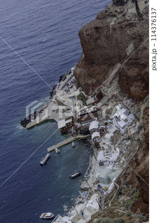 Greece, Santorini, Oia, Amoudi Bay seen from the sky 114376137