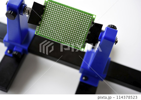 A printed circuit board for trace elements. Radio electronics. A holder for printed circuit boards. A printed circuit board for trace elements. Radio electronics. A holder for printed circuit boards. 114378523