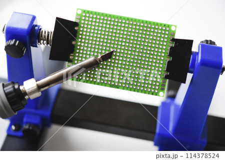 A printed circuit board for trace elements. Radio electronics. A holder for printed circuit boards. A printed circuit board for trace elements. Radio electronics. A holder for printed circuit boards. 114378524