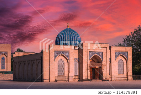 ancient Islamic madrasah Muyi Muborak museum library in Tashkent in Uzbekistan. Architectural complex Hazrati Imam at sunset 114378891