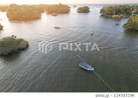 Tourist boat between islands 114383196