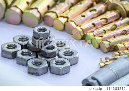 Close up scene the set of special nuts and zinc coating bolts for construction purpose. Close up scene the set of special nuts and zinc coating bolts for construction purpose. 114383212