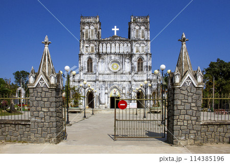 Phu Yen, Vietnam - March 9, 2022 : View Of Mang Lang Church On A Sunny Day. Mang Lang Church Is One Of The Oldest Churches In Vietnam Imbued With An Architectural Style Of The 19th Century. 114385196