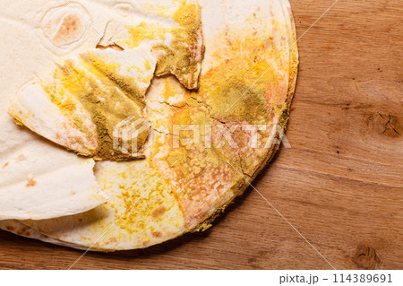 Rotten bread on table. 114389691
