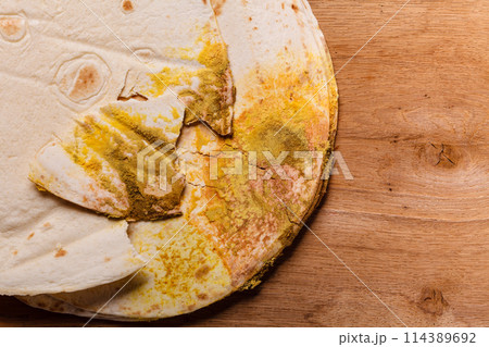 Rotten bread on table. 114389692