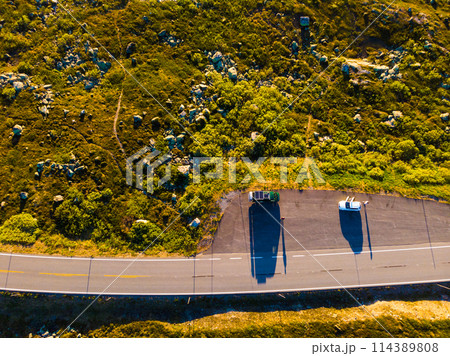 Top down view. Camper car on road, Hardangervidda plateau, Norway 114389808