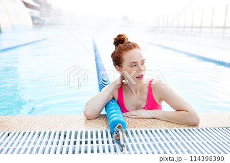 tired good-looking ginger swimmer looking aside tired good-looking ginger swimmer looking aside 114398390