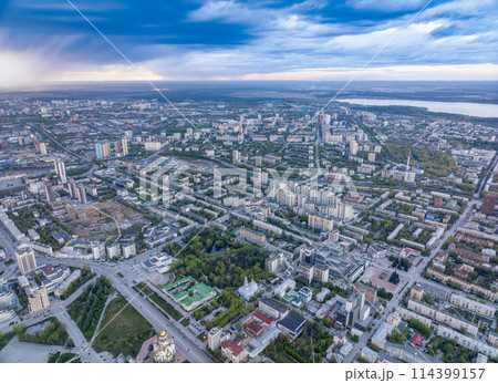 Yekaterinburg aerial panoramic view in summer sunset. Ekaterinburg is the fourth largest city in Russia located in the Eurasian continent on the border of Europe and Asia. Yekaterinburg aerial panoramic view in summer sunset. Ekaterinburg is the fourth largest city in Russia located in the Eurasian continent on the border of Europe and Asia. 114399157