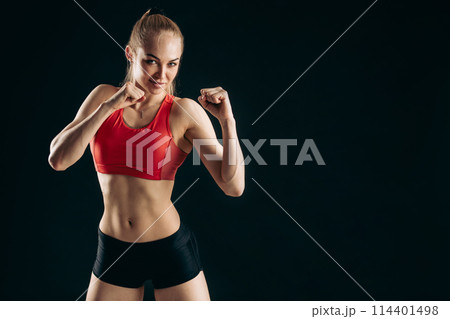 awesome sporty fit girl is ready to fight. 114401498