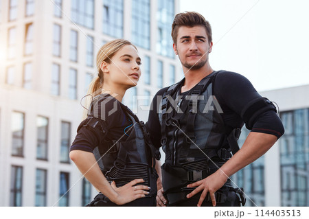 two joyful sportsmen are in black suits for rms training two joyful sportsmen are in black suits for rms training 114403513