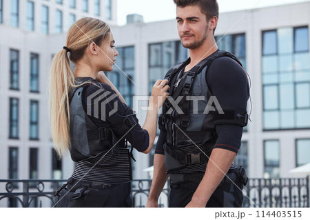 guy with his girlfriend are going to tesr ems costume guy with his girlfriend are going to tesr ems costume 114403515