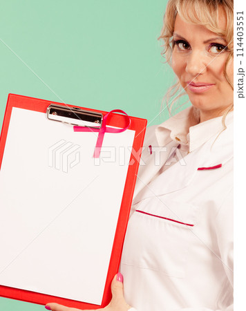 Female doctor with folder and pink ribbon Female doctor with folder and pink ribbon 114403551