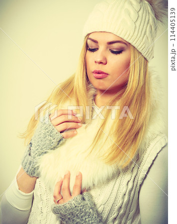 Attractive woman wearing winter clothes. Attractive woman wearing winter clothes. 114405139