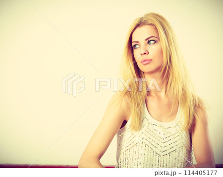 Attractive blonde woman potrait Attractive blonde woman potrait 114405177