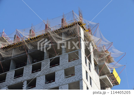 Construction site with cranes against the sky. Construction machinery, construction of skyscrapers. 114405205
