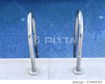 ladder of beautiful and clean blue swimming pool with copy space ladder of beautiful and clean blue swimming pool with copy space 114408767