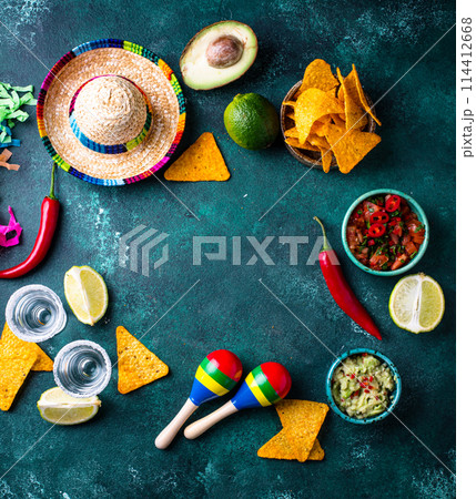 Traditional Mexican food nachos, salsa, guacamole, tequila. 114412668