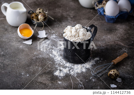Baking ingredients with flour and eggs Baking ingredients with flour and eggs 114412736