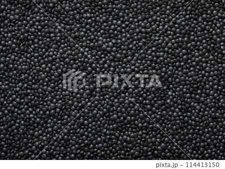 Black organic raw lentils grain seeds textured background. 114413150