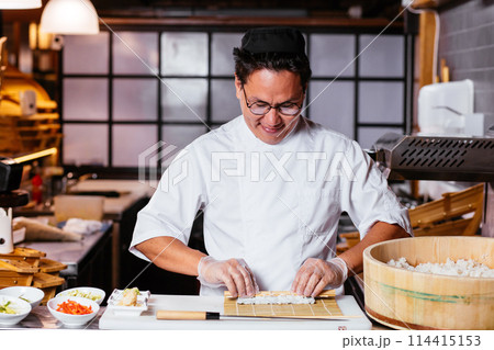 close up photo. happy creative chef likes his job 114415153